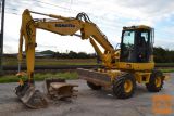 2010 Komatsu PW98MR-6 bager na kolesih